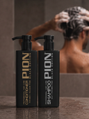 Barber washing a client's hair with PION Keratin Complex Shampoo before a haircut.